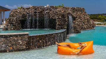 Outdoor pool, open 8:00 AM to 10:00 PM, sun loungers