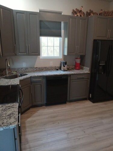 Beautiful retreat with gameroom and outdoor grill.