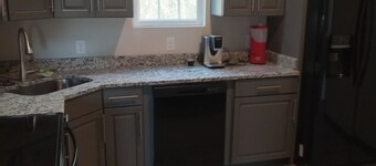 Beautiful retreat with gameroom and outdoor grill.