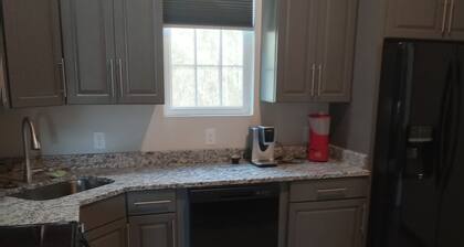 Beautiful retreat with gameroom and outdoor grill.