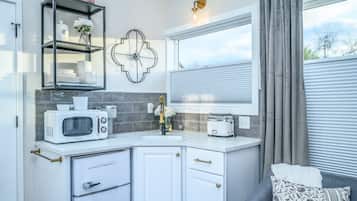 Fridge, microwave, coffee/tea maker, toaster