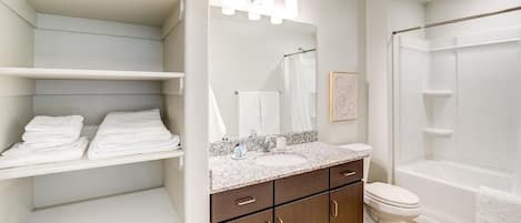 Hair dryer, towels, soap, shampoo