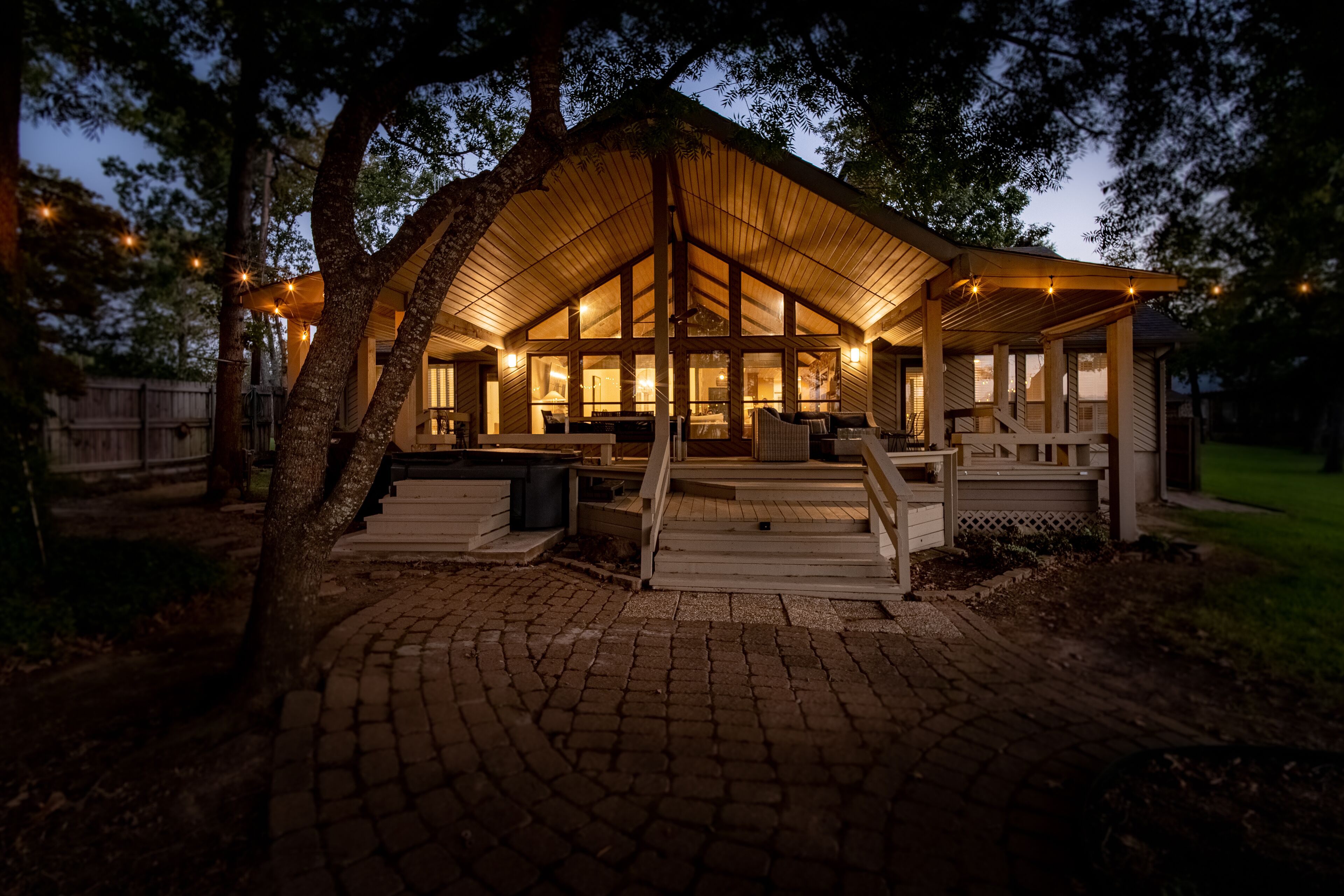 Outdoor lighting, oversized covered patio and hot tub