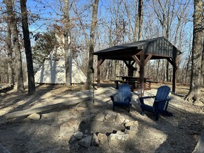 Outdoor dining - A teepee on 1200-acre ranch where secluded woods envelope the grounds.  (Steelville)