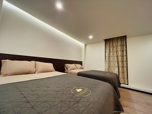 Deluxe Room, 2 Double Beds | Egyptian cotton sheets, premium bedding, down comforters - Jovis Hotel (Villa Aldama)