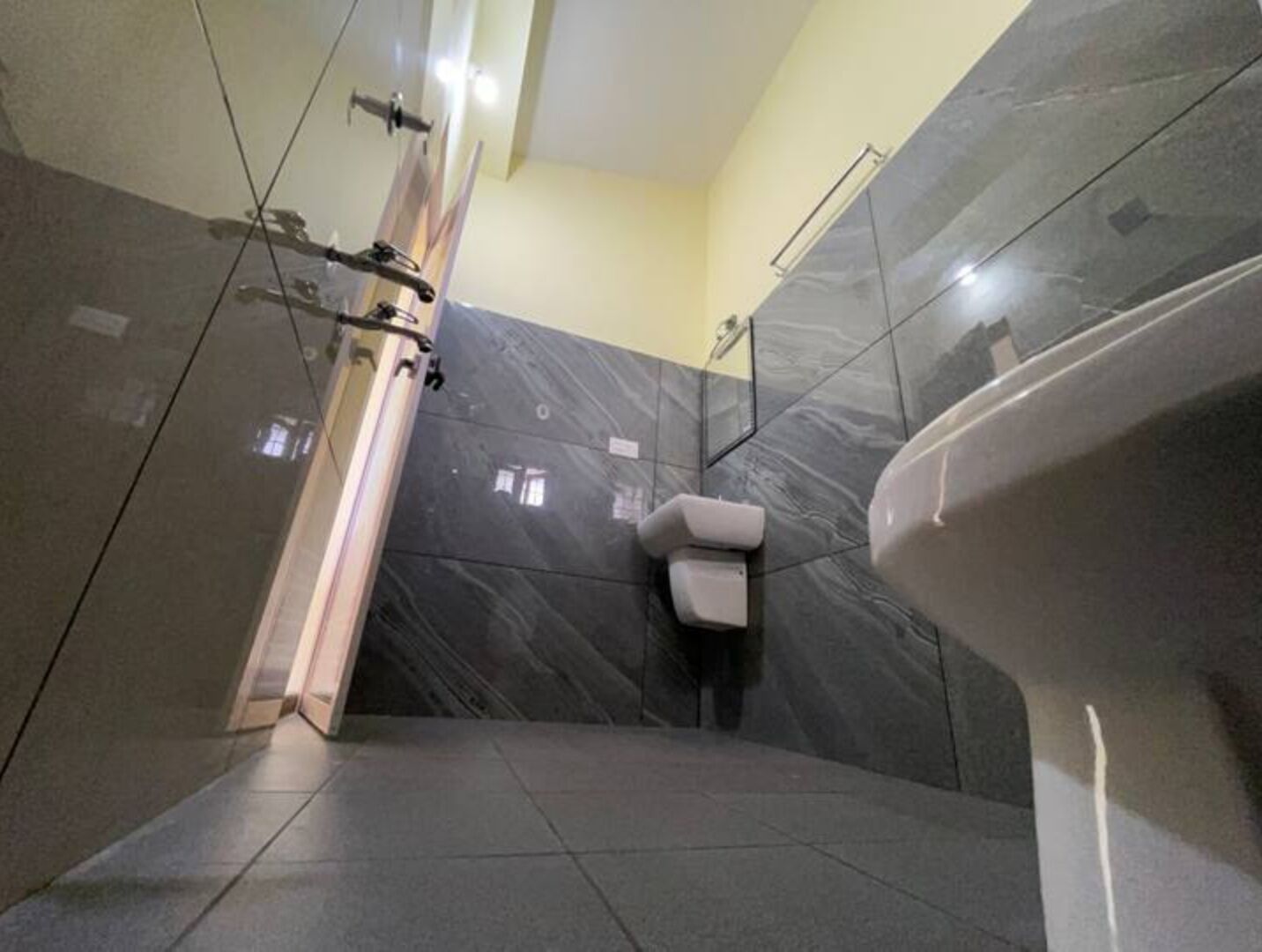 Shower, towels, soap, toilet paper