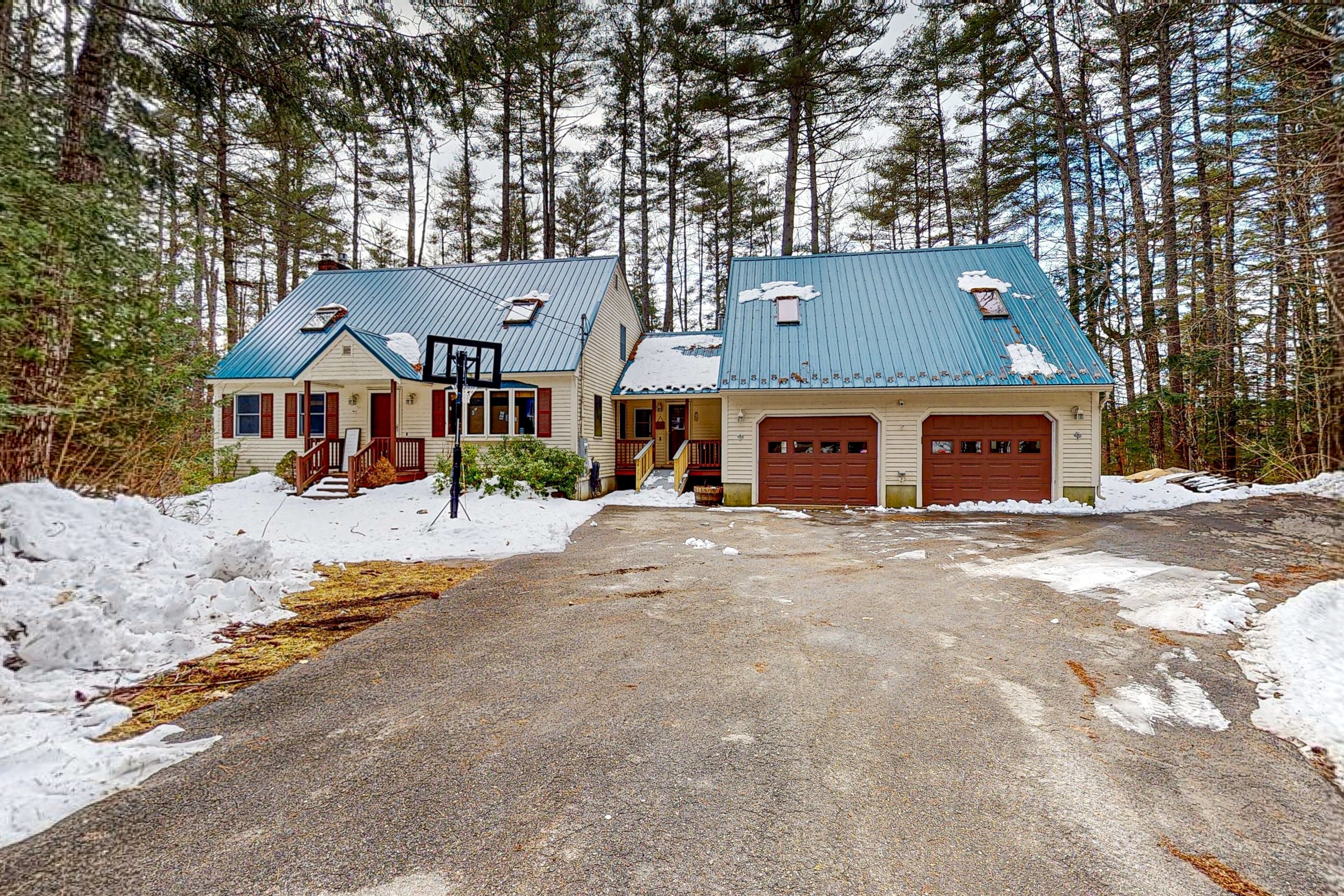 Peaceful lakefront retreat with private hot tub, game room, & deck - near skiing