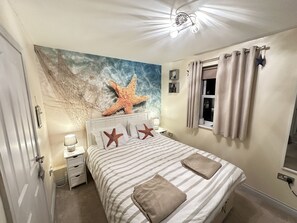 1 dormitorio, tabla de planchar con plancha, wifi gratis y ropa de cama