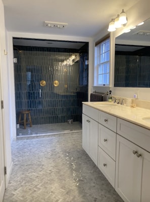 Shower, hair dryer, towels, soap