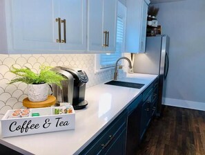 Fridge, microwave, oven, stovetop - Modern Bungalow at Riverfront Stadium (Wichita)