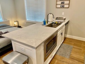 Fridge, microwave, oven, stovetop - Modern Studio Apartment in Heart of CWE
 (St. Louis)