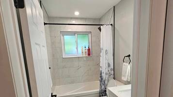 Hair dryer, towels, soap, shampoo