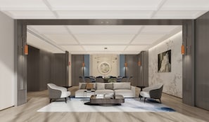 A modern lobby with a sofa set, a coffee table, and a conference table in the background. - Holiday Inn Express Turpan by IHG (Turpan)
