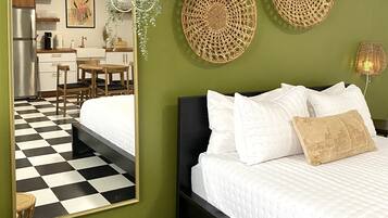 Premium bedding, memory foam beds, laptop workspace, free WiFi