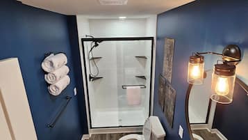 Shower, hair dryer, towels, soap