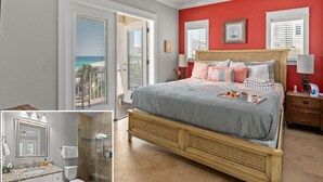 A bedroom with a large bed, a ceiling fan, and a view of the ocean through a sliding door. - Few steps across from beach, Gulf views, Saltwater pool, Golf cart (Miramar Beach)