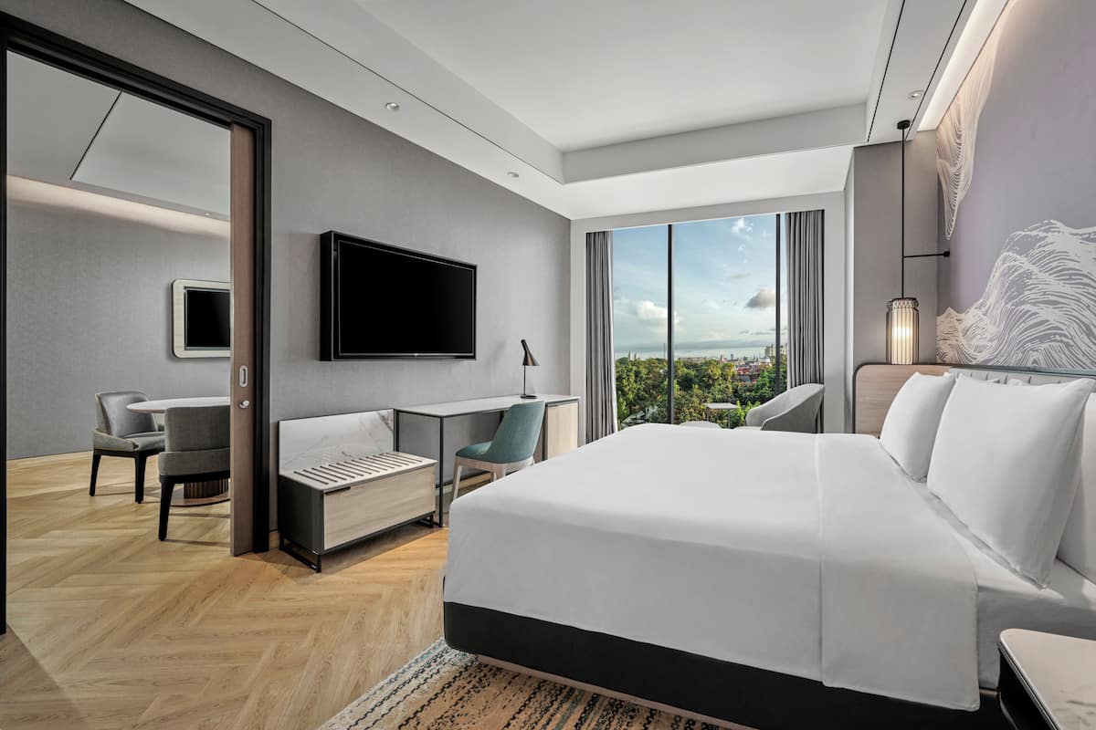 Suite, 1 King Bed with Sofa bed | In-room safe, desk, laptop workspace, iron/ironing board