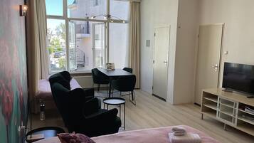 Family Triple Room | In-room safe, desk, iron/ironing board, cribs/infant beds