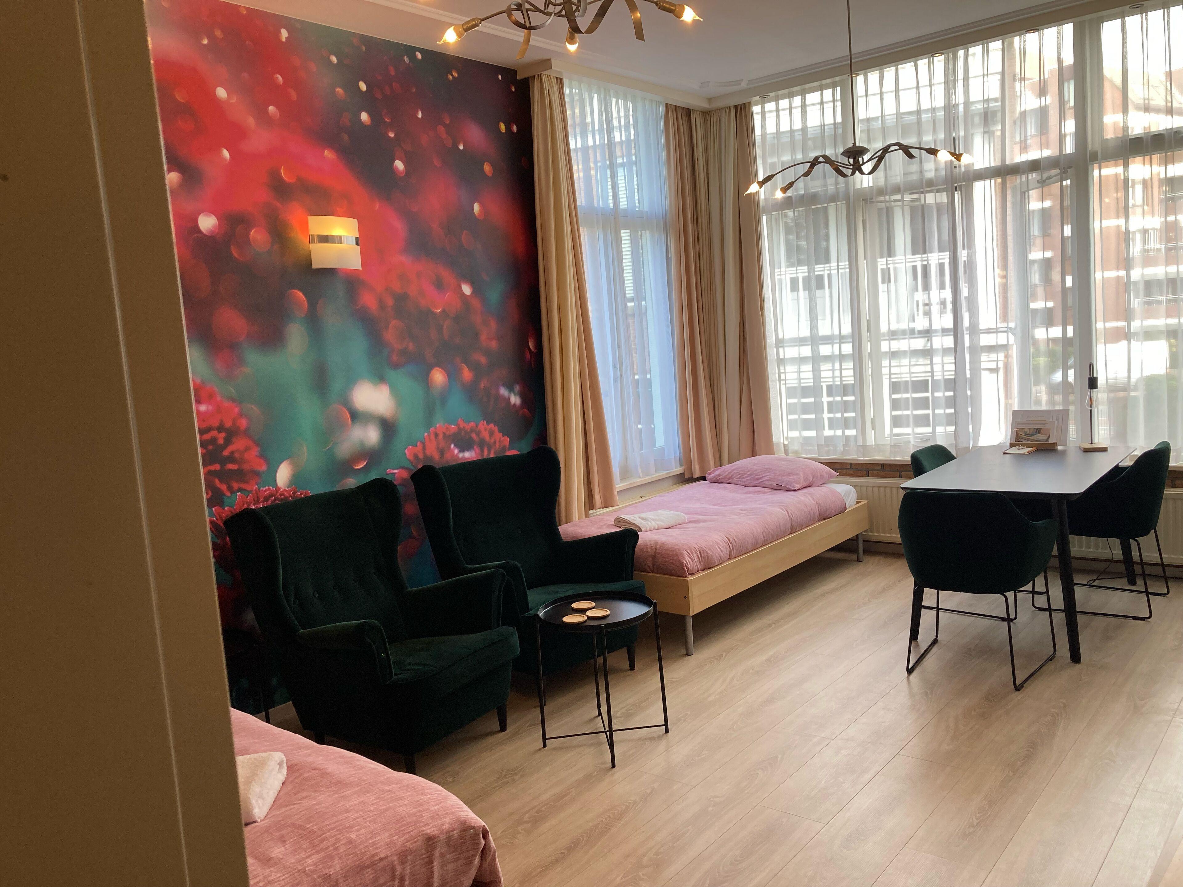 Family Triple Room | Living area | Flat-screen TV