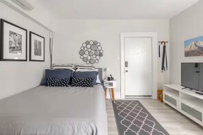 1 bedroom, desk, iron/ironing board, travel cot