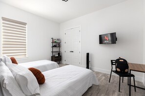 3 quartos, ferros/tábuas de passar roupa, berço de viagem, Wi-Fi