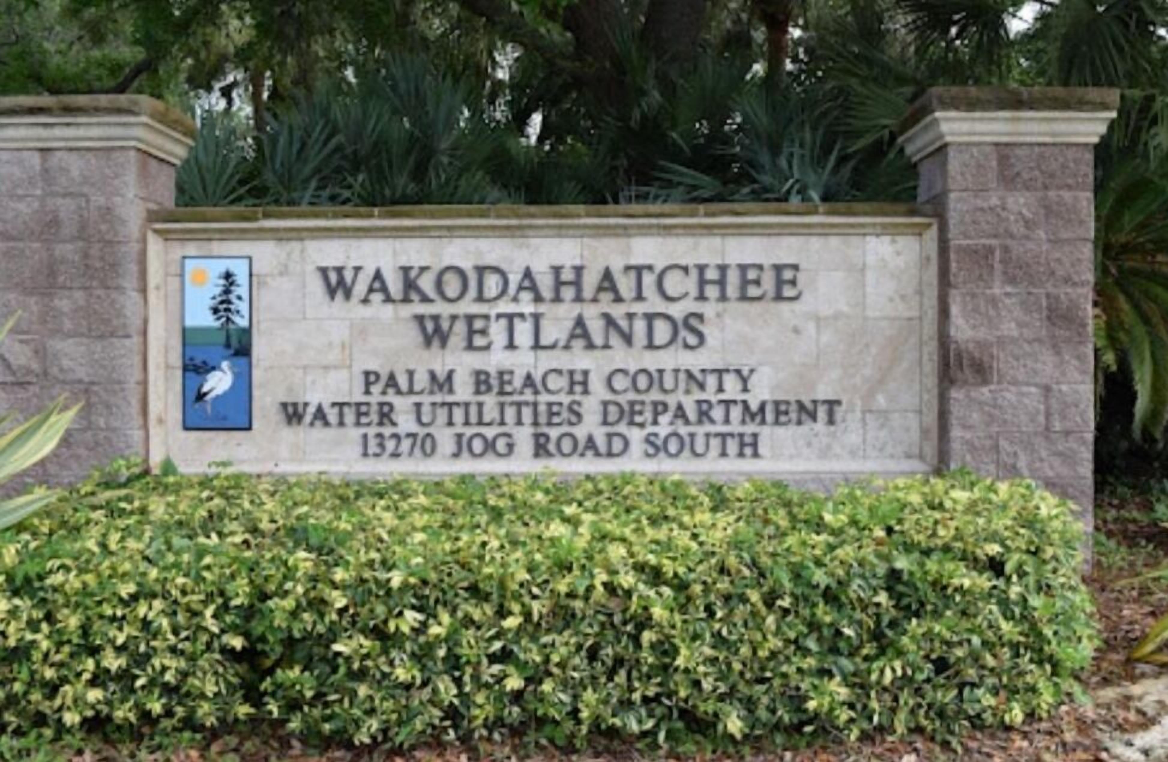 A sign for the Wakoda Hatchree Wetlands, Palm Beach County Water Utilities Department, located at 13270 Jog Road South.