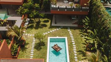 Family Villa | Minibar, in-room safe, individually decorated, individually furnished