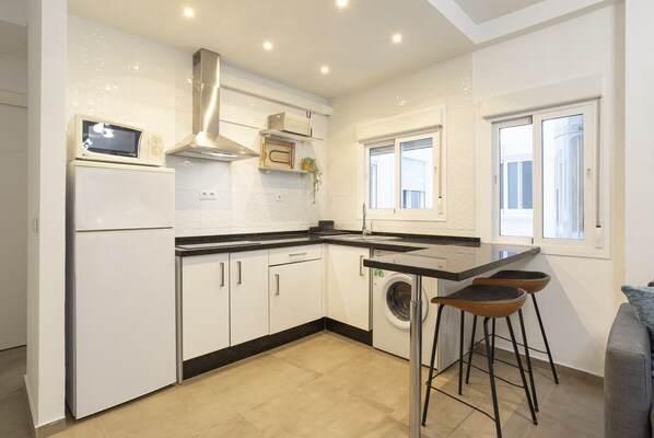 Fridge, microwave, coffee/tea maker, toaster