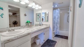 Shower, hair dryer, towels