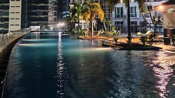 Outdoor pool, open 6:00 AM to 10:00 PM, free pool cabanas