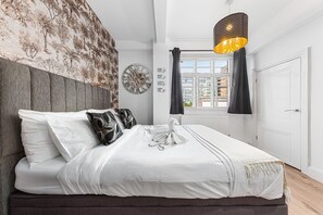 1 dormitorio, tabla de planchar con plancha, wifi y ropa de cama