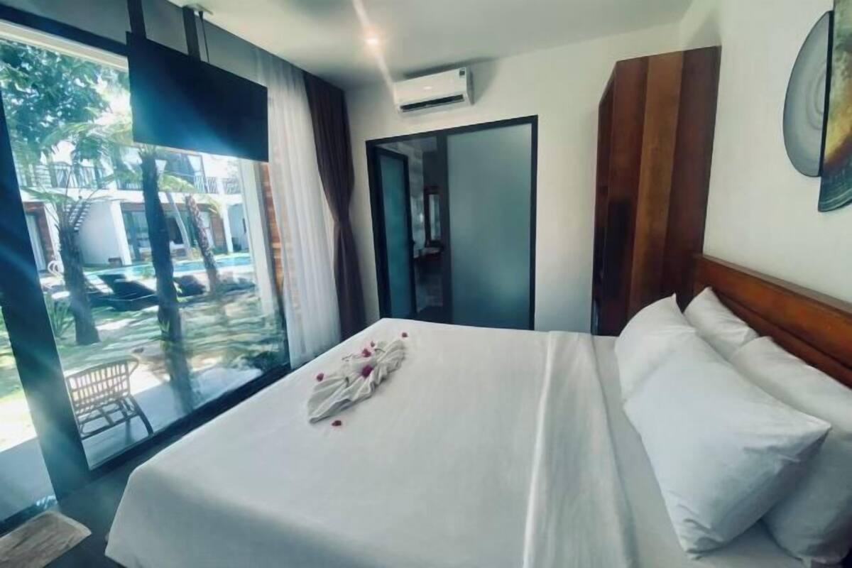 Premium bedding, down comforters, memory foam beds, minibar