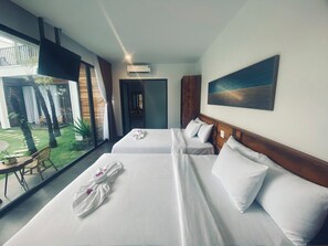 Family Quadruple Room, 2 Queen Beds, Pool View | Premium bedding, down comforters, memory foam beds, minibar - Tuong Vy Boutique Hotel (Phan Thiet)