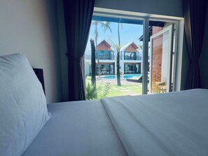 Premium bedding, down duvets, memory-foam beds, minibar - Tuong Vy Boutique Hotel (Phan Thiet)
