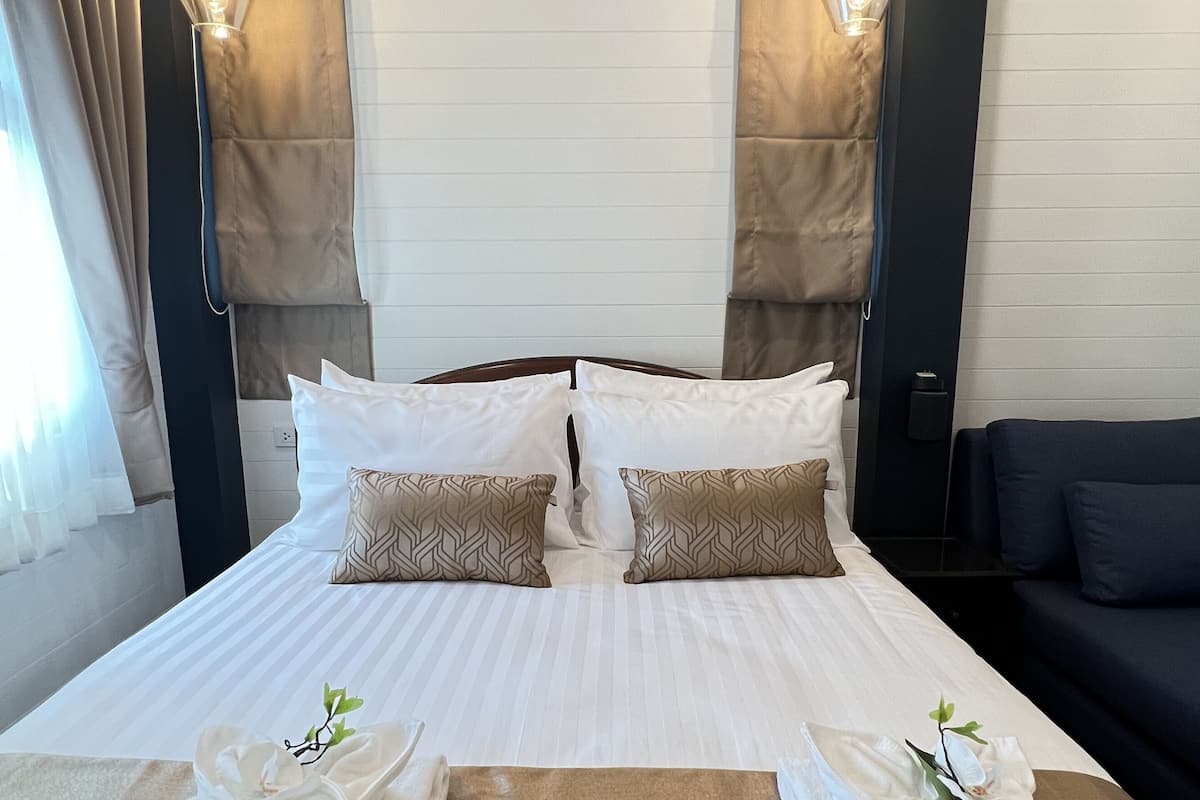 Suite – deluxe | 1 soverom, sengetøy av topp kvalitet og minibar (inkludert)