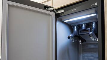 A Samsung refrigerator with a water dispenser and a freezer compartment.
