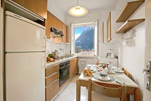 Family Apartment, Multiple Bedrooms (Garda View) | Private kitchen | Fridge, oven, stovetop, coffee/tea maker