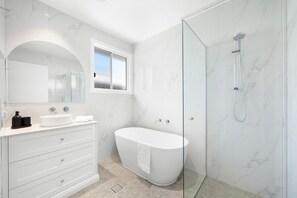 Shower, hair dryer, towels, soap