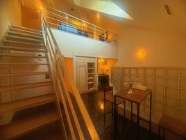 Deluxe Room | Down comforters, individually decorated, individually furnished, desk