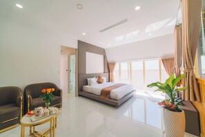 Familjerum för fyra | Egyptiska bomullslakan, sängtillbehör av högsta kvalitet och duntäcken