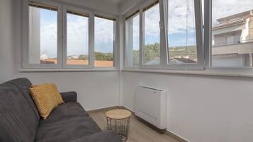 21-inch flat-screen TV with cable channels