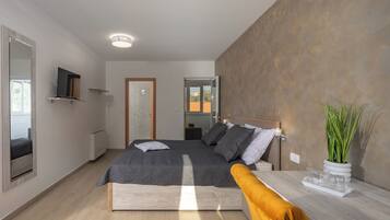 1 bedroom, laptop workspace, bed sheets