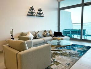 Living area - SuperHost - Peaceful 1BR Apt With Balcony in Front of the Sea (Dubai)