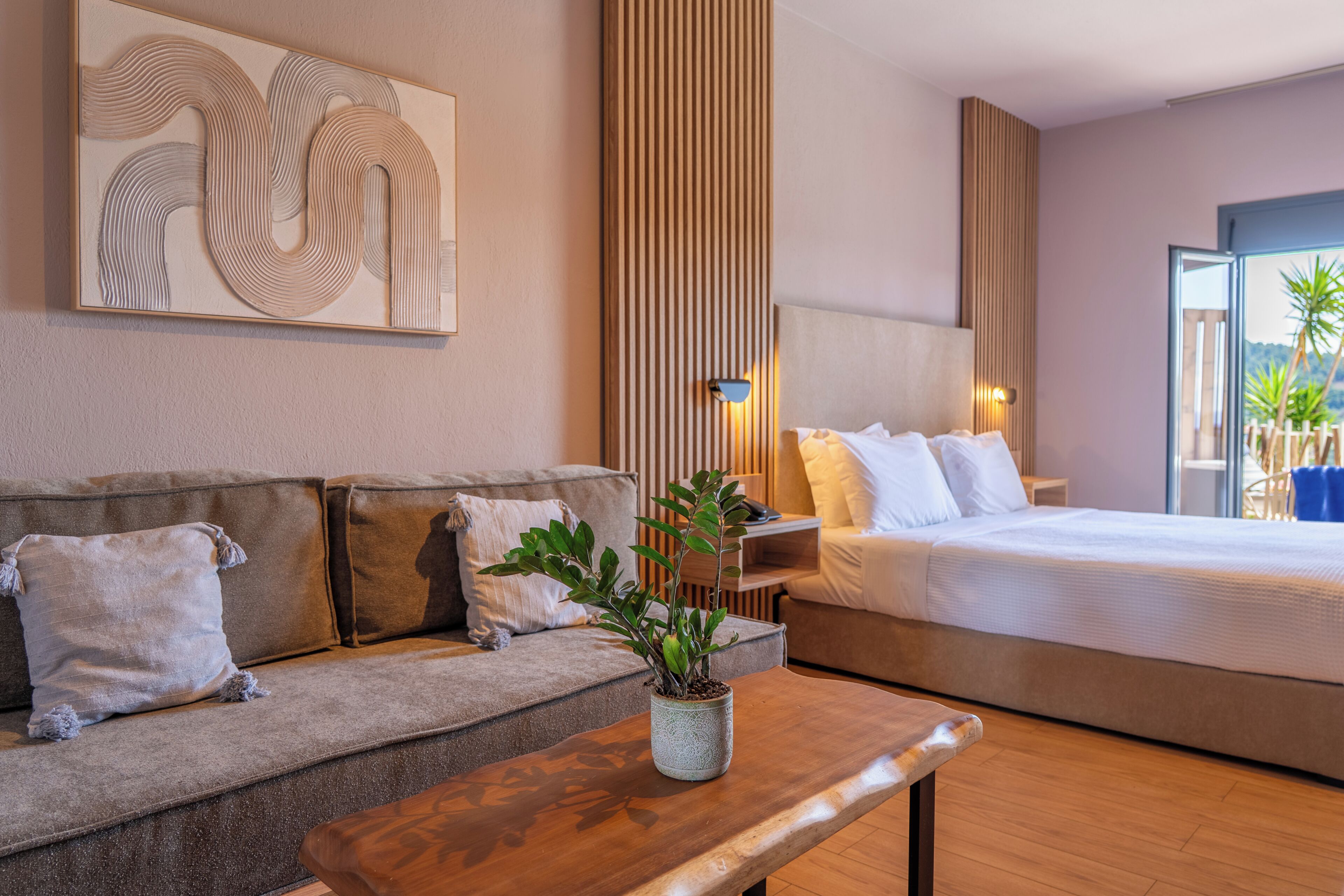 Deluxe Double or Twin Room, Jetted Tub, Partial Sea View | In-room safe, blackout curtains, soundproofing, iron/ironing board
