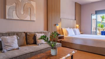 Deluxe Double or Twin Room, Jetted Tub, Partial Sea View | In-room safe, blackout curtains, soundproofing, iron/ironing board
