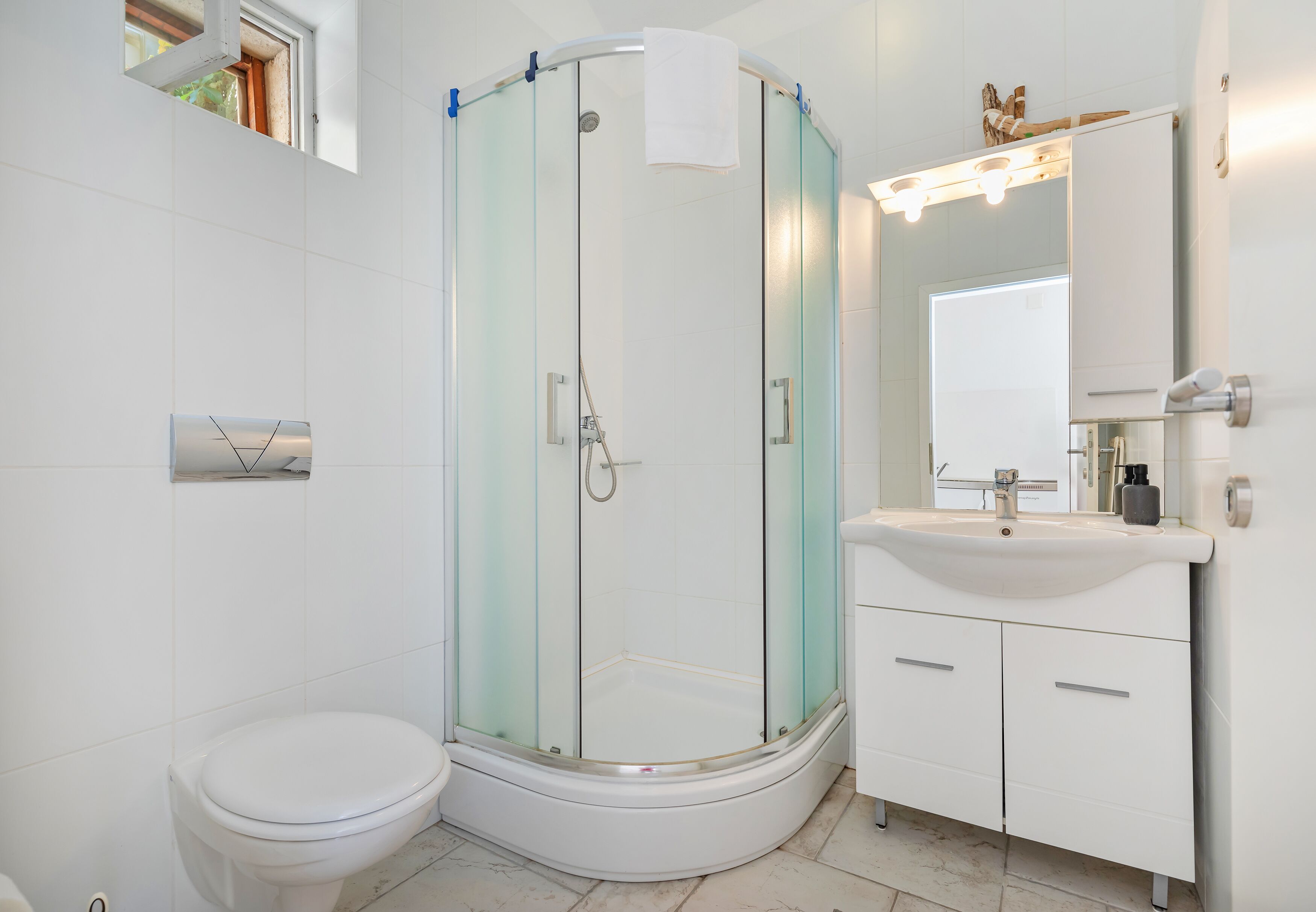 Hair dryer, towels, soap, toilet paper