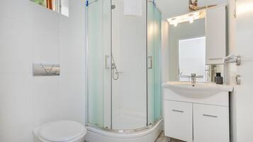 Hair dryer, towels, soap, toilet paper