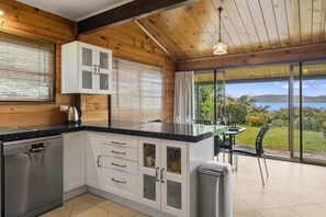 Fridge, microwave, oven, stovetop - Kawaha on the Lake | Great Lake Views with Kayaks (Rotorua)