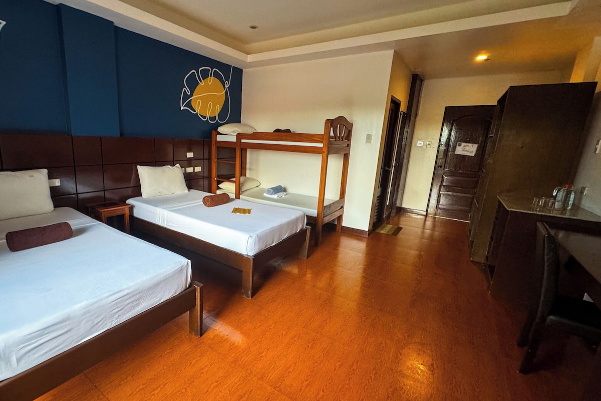 Family Room | Premium bedding, individually decorated, individually furnished, desk