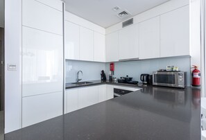 Private kitchen - SuperHost - Serene 1BR in District One With Artificial Beach (Dubai)
